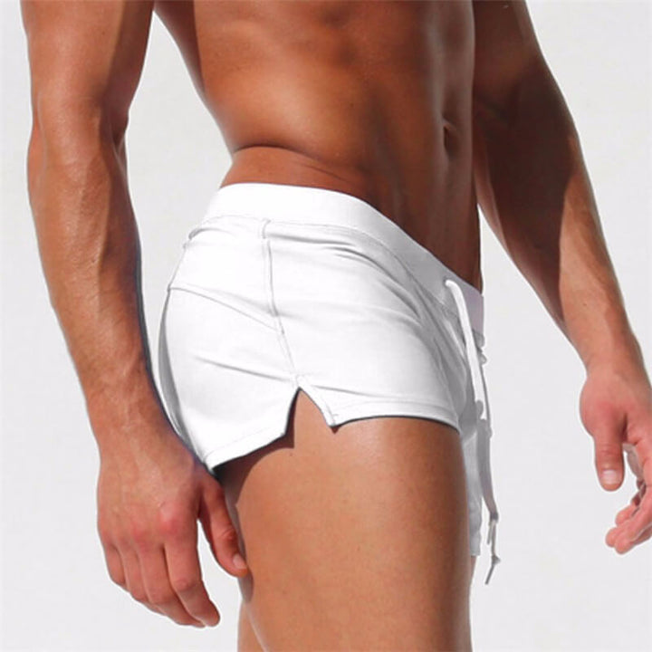 Menns ensfarget badeshorts, hurtigtørkende, komfortabelt for strand og basseng.