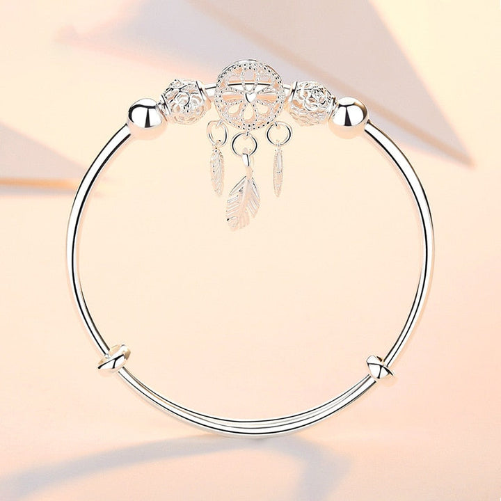 Luksuriøst drømmefanger armbånd i sterlingsølv, et tidløst tilbehør for dame.