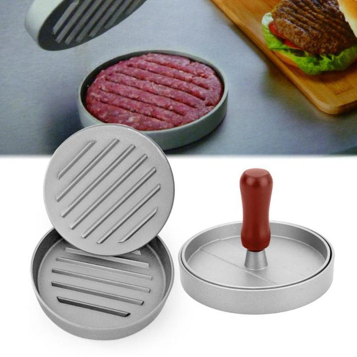 Robust hamburgerpresse i metall for perfekte, jevne biffburgere hjemme. Ideell for grilling og matlaging.