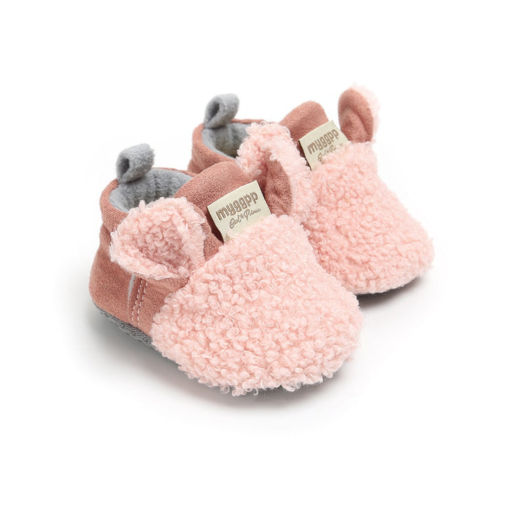 Søte lammesko for spedbarn, perfekte som tøfler og for babyens aller første skritt.