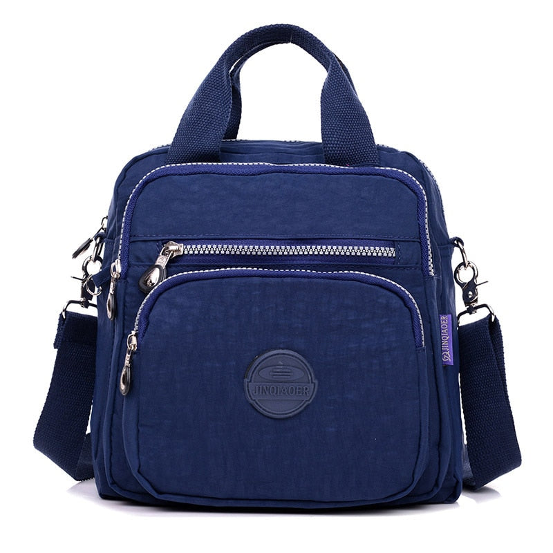 Lettvekt crossbody for kvinner, slitesterk og vanntett for alle reiser.