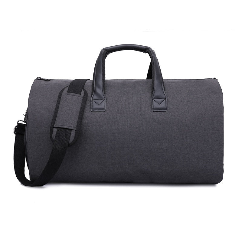 Stilfull unisex dufflebag med integrert dressbag, romslig interiør for effektiv pakking.