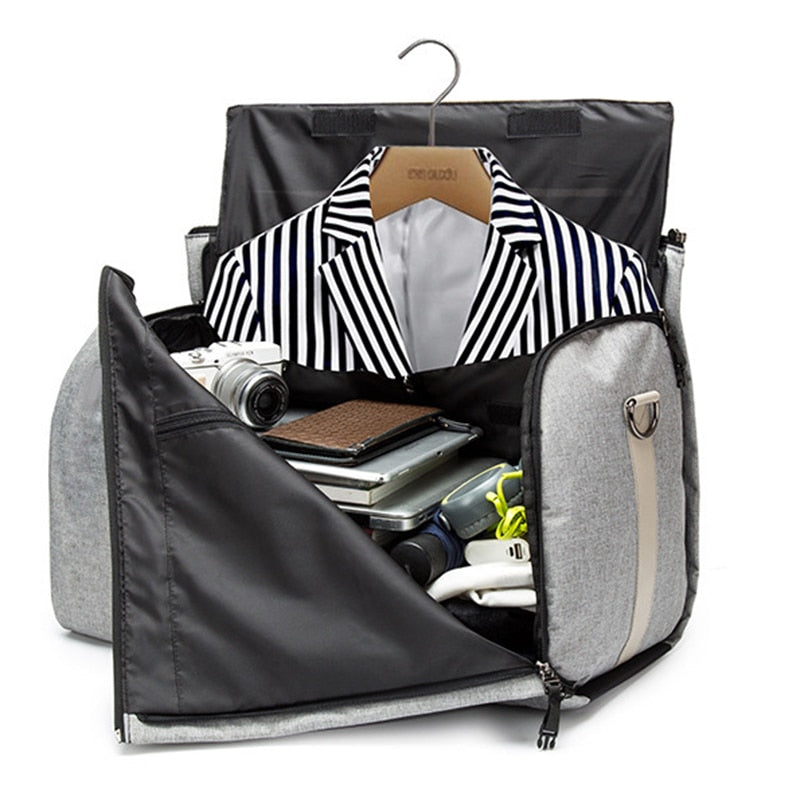 Vanntett svart reisebag med laptoplomme, ideell for weekendturer og forretningsreiser.