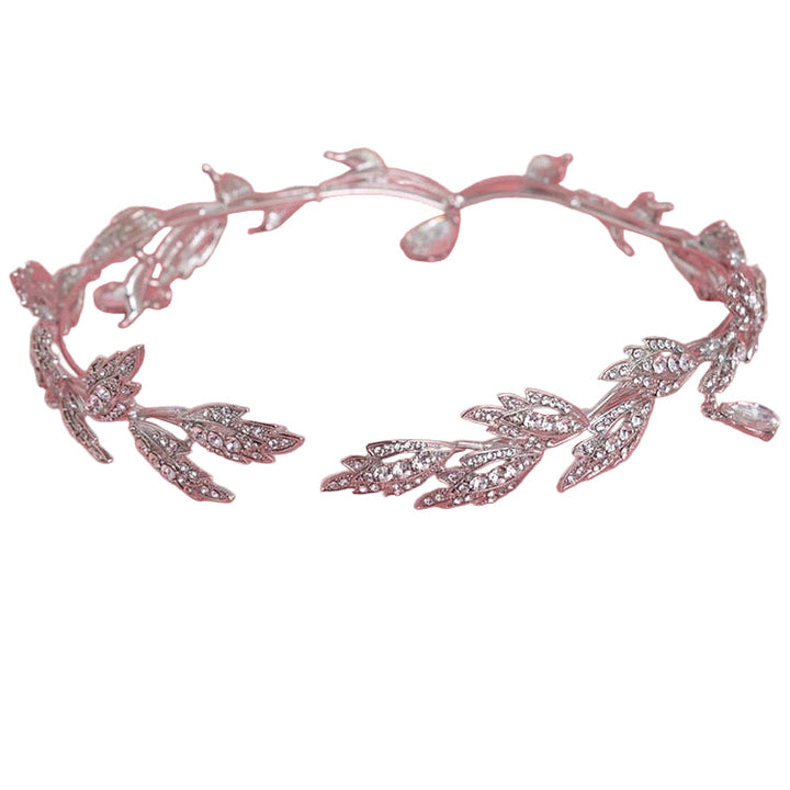 Luksuriøs krystalltiara for kvinner med glitrende steiner. Perfekt hårpynt til fest og bryllup.
