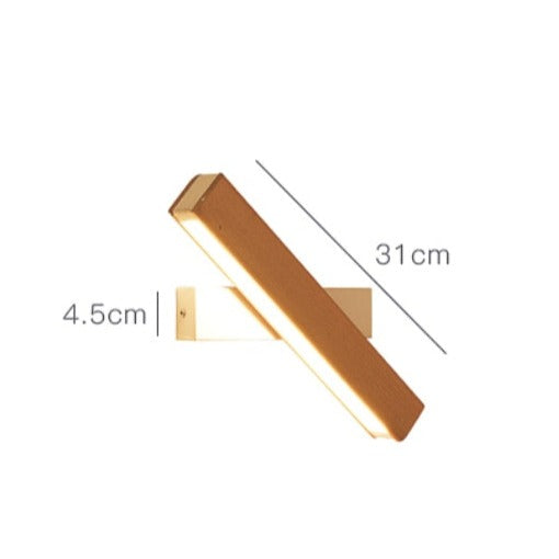 Justerbar LED-vegglampe med 360° rotasjon, ideell for lesing eller generell belysning.