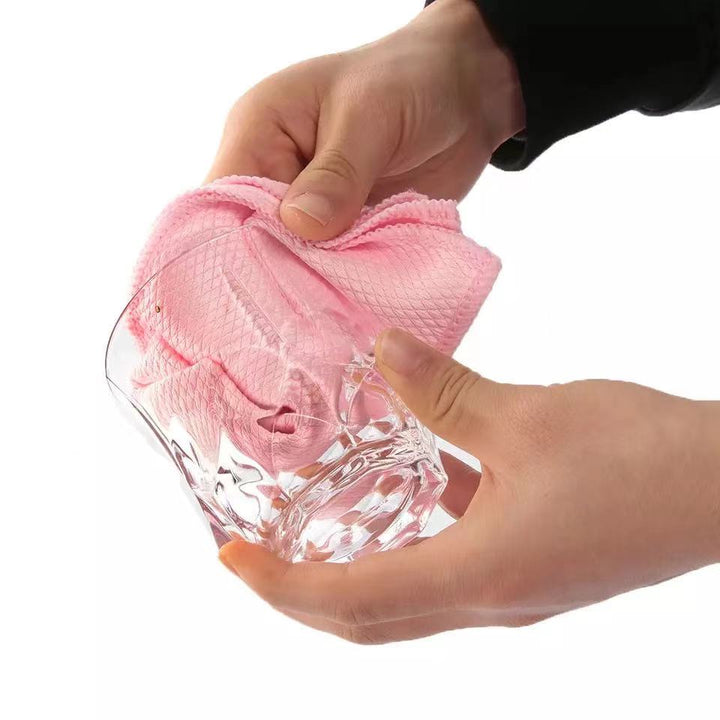 Detaljbilde av den myke og absorberende teksturen til en høykvalitets mikrofiberklut.