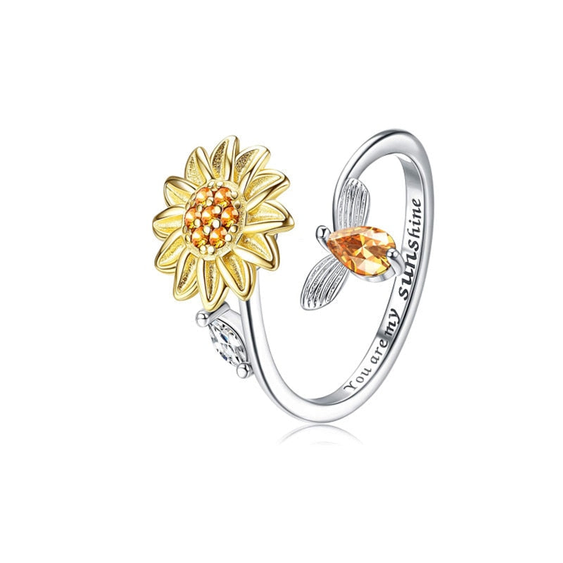 Kvinner solsikke angstring for stresslindring. Justerbar fidget ring for økt fokus og velvære.