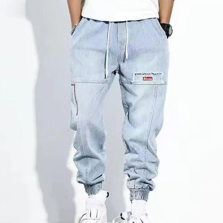 Casual bomullsbukser for menn. Komfortabel løs passform, ideell som fritidsbukse eller streetwear.