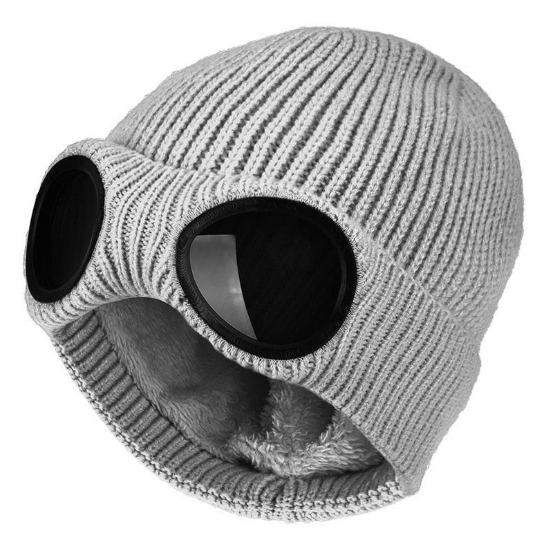 Varm unisex beanie med integrerte beskyttende briller. Vindtett for kalde dager og sport.