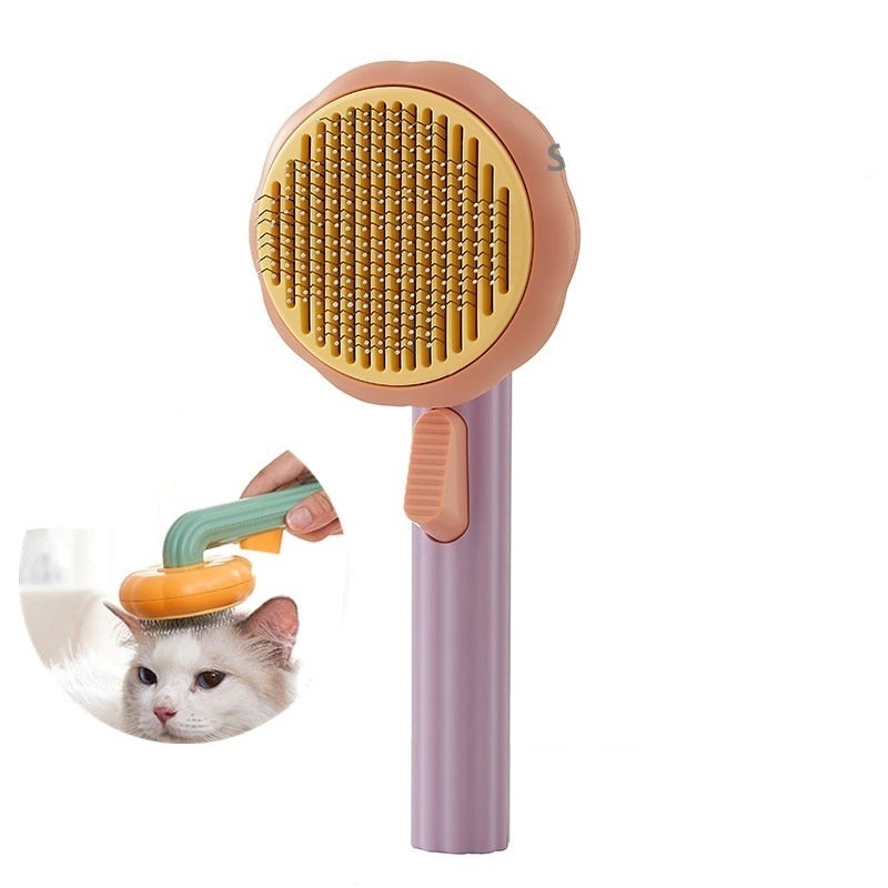 Gresskar kjæledyrbørste med selvrensende funksjon. For en frisk og glansfull pels hos din hund eller katt.