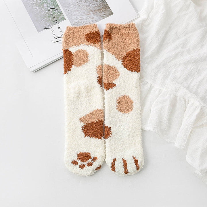 Myke korallfleece sokker for kvinner med unikt potetrykk, ideelle for varme vinterkvelder.