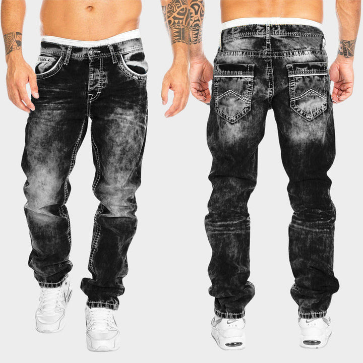 Komfortable herre slim fit dongeribukser, allsidig for casual eller stilfulle antrekk. Moderne passform.