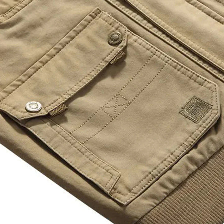 Allsidig bomullsvest for herrer, robust design, egnet som fiskevest, turvest eller reisevest.