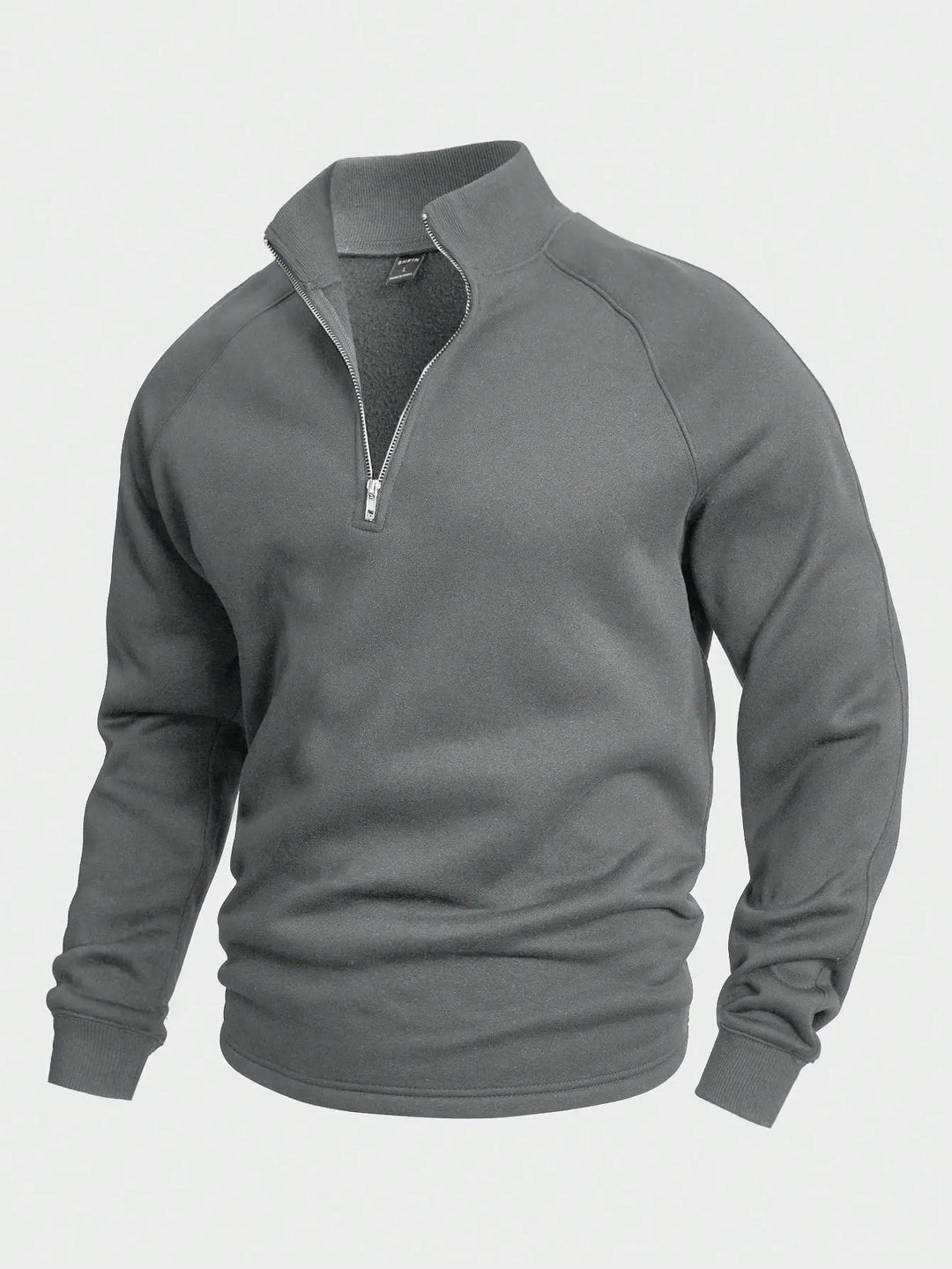 Sporty og elegant herre halv-zip i pustende bomullsmiks for aktiv fritid.