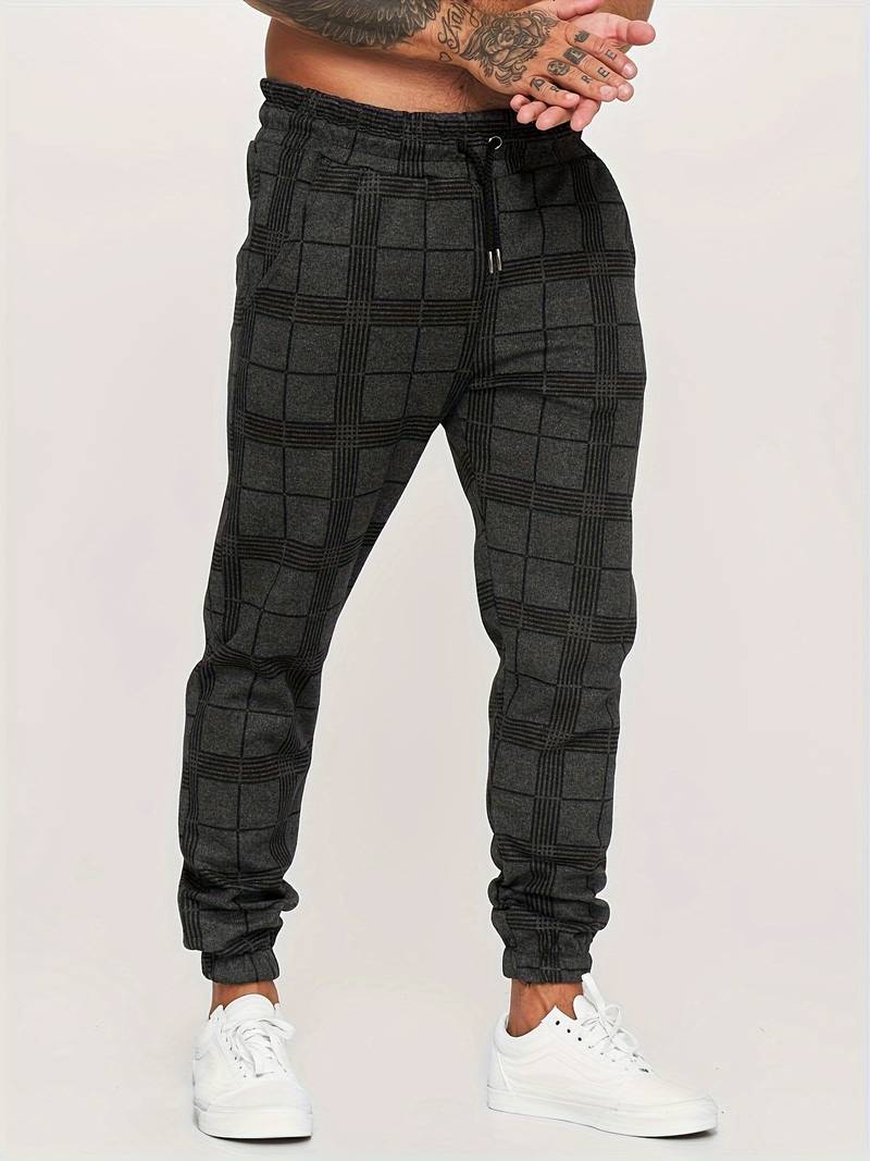 Komfortable herre joggebukser i myk bomullsmiks, ideelle for avslappede dager og sporty stil.