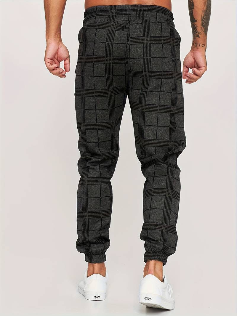 Allsidige herre fritidsbukser i bomullsmiks, perfekte for komfort hjemme eller en sporty look ute.