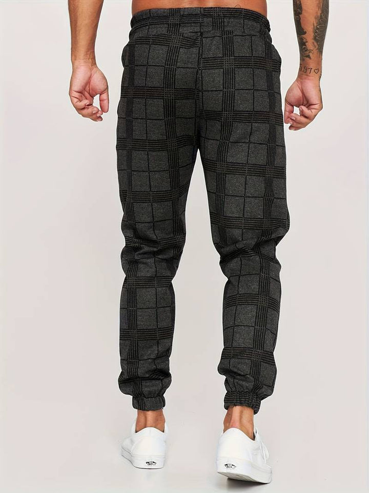 Allsidige herre fritidsbukser i bomullsmiks, perfekte for komfort hjemme eller en sporty look ute.