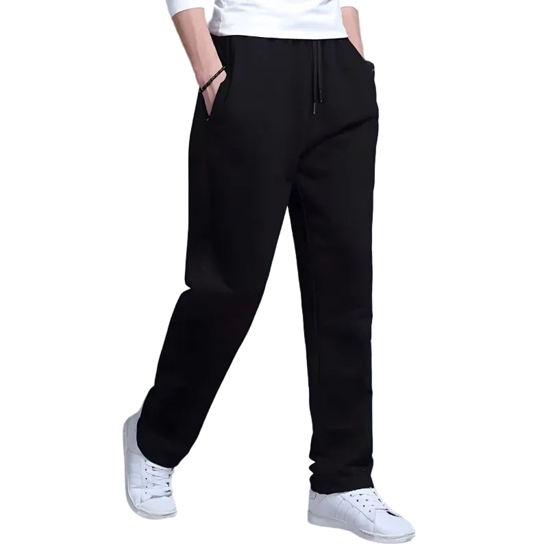 Moderne herre joggebukser i svart for komfortabel hverdagsbruk og sporty stil. Perfekt for fritid.