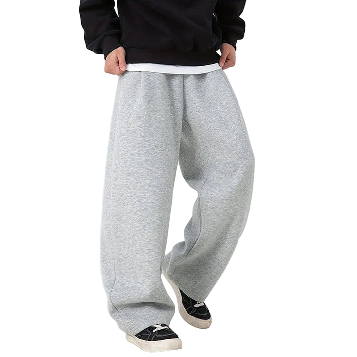 Grå herre oversized joggebukser med brede ben, perfekt for komfort og avslappet stil.