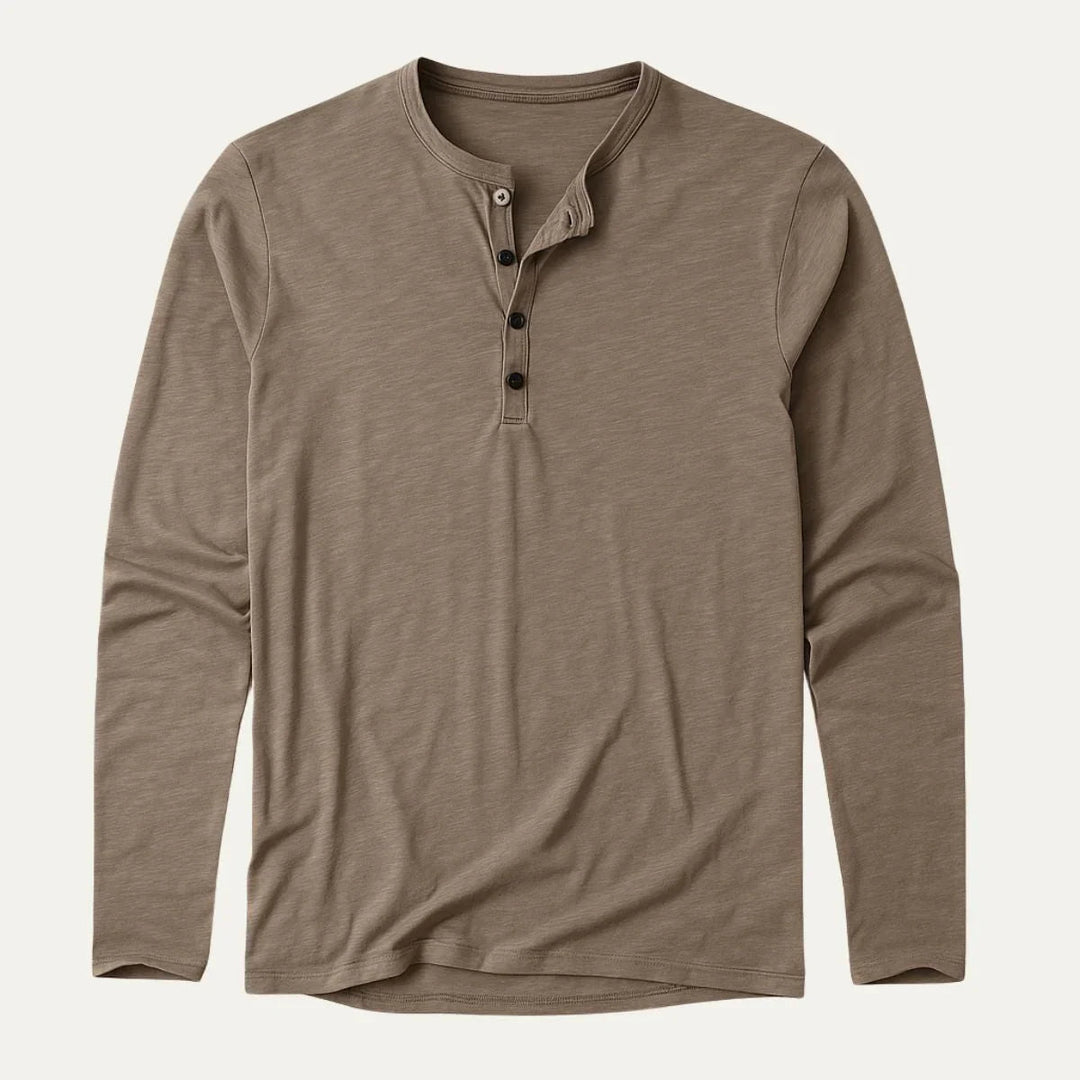 Elegant herrepolo med lange ermer og båndkrage, laget av pustende bomull for optimal komfort og stil.