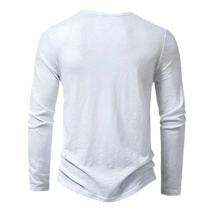 Ny herre langermet polo i bomull med moderne båndkrage. Perfekt for en oppdatert casual look med stil.