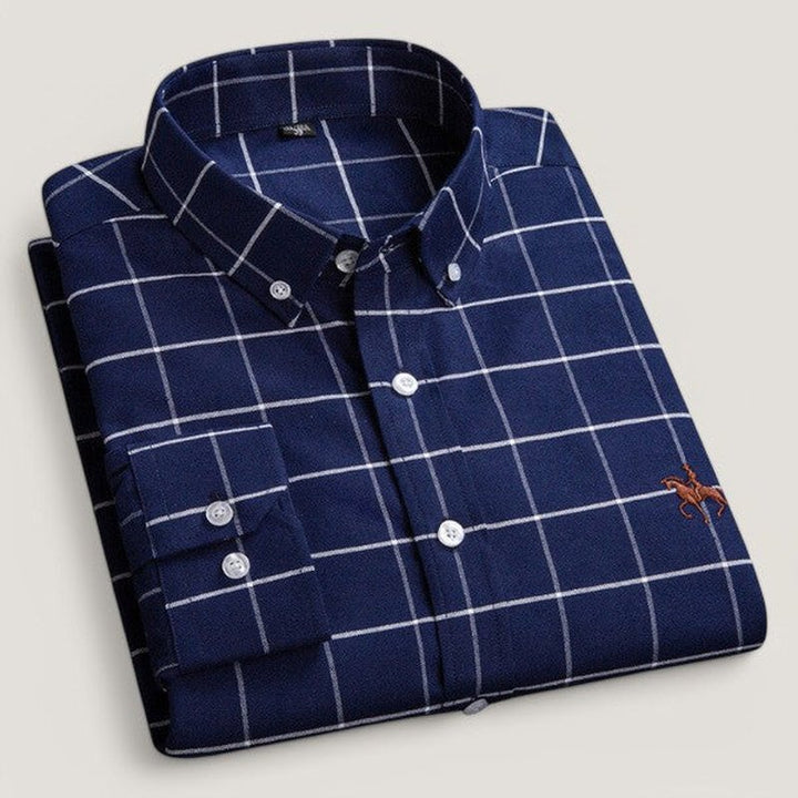 Langermet herreskjorte i klassisk stil, uformell look, passer til jeans. Enkel og elegant bomullsblanding.