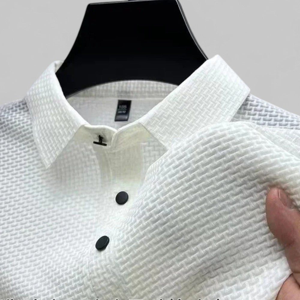 Stilig herre polo i kortermet design, allsidig grunnleggende plagg i myk bomullsblanding.