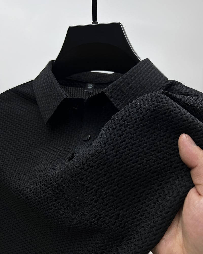 Stilfull herre poloskjorte for sommer og fritid. Kortermet modell i pustende mesh-materiale for hverdagsbruk.