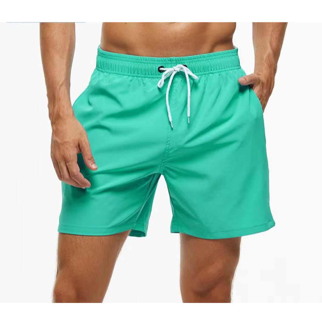 Herre badeshorts med lommer, hurtigtørkende og funksjonelle for strand og sommeraktivitet.