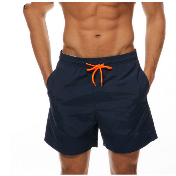 Herre badeshorts for vannsport og aktivitet, hurtigtørkende og komfortable ved bassenget.