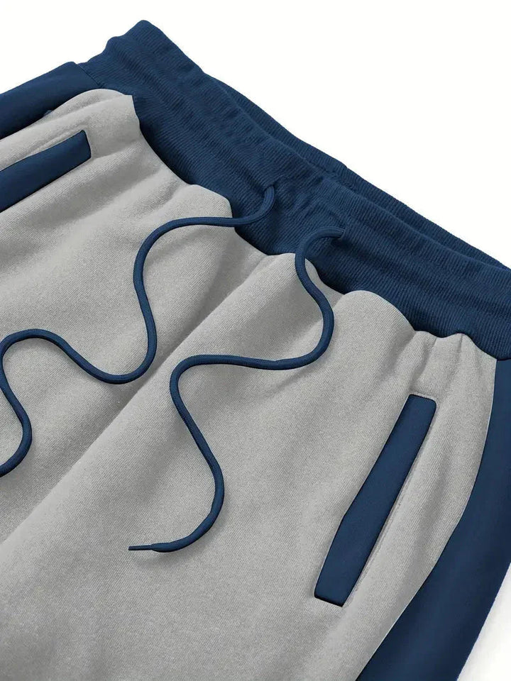 Herre treningsbukse med elastisk midje og komfortabel passform, perfekt for trening, fitness og fritid.