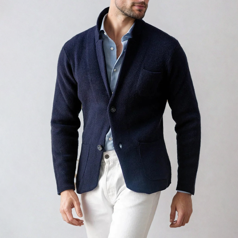 Nærbilde av stoffet på en stilren herreblazer, som viser kvalitet og elegant tekstur. Komfortabel passform.