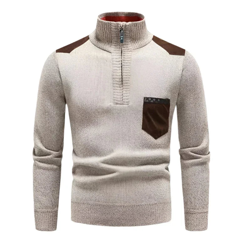 Moteriktig herre genser i ull med halv zip og stilige patchwork-paneler for en moderne look.