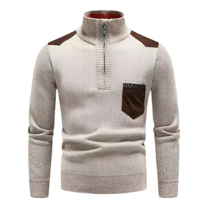 Moteriktig herre genser i ull med halv zip og stilige patchwork-paneler for en moderne look.