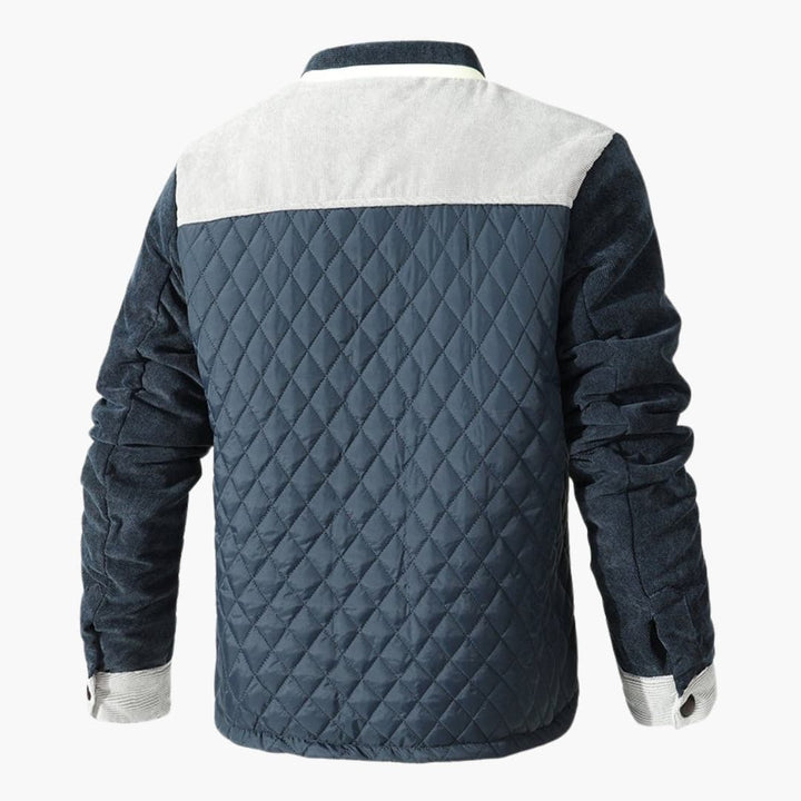 Stilren herre vattert jakke med elegante kontrastdetaljer, perfekt for overgangsvær.