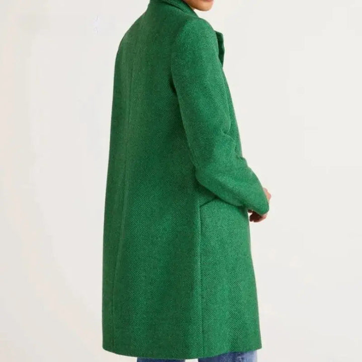 Detalj av stoffet på trendy vinterjakke for kvinner. Myk, varm og komfortabel tekstur på yttertøyet.