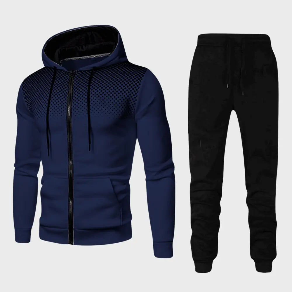 Mannlig modell viser frem funksjonelt grått treningssett, perfekt for oppvarming eller avslapping.