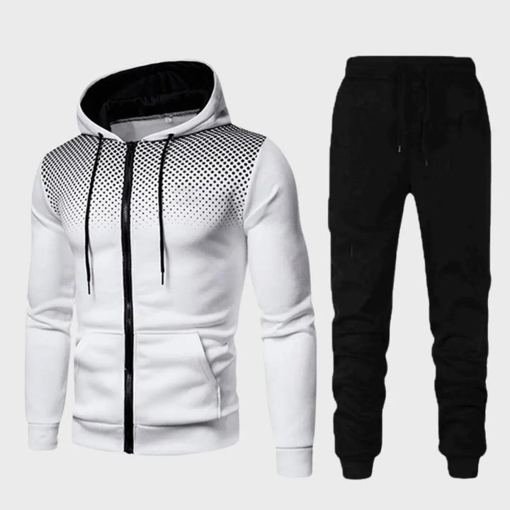 Nærbilde av stoffet på det komfortable grå herre treningssettet, myk polyester/bomull.