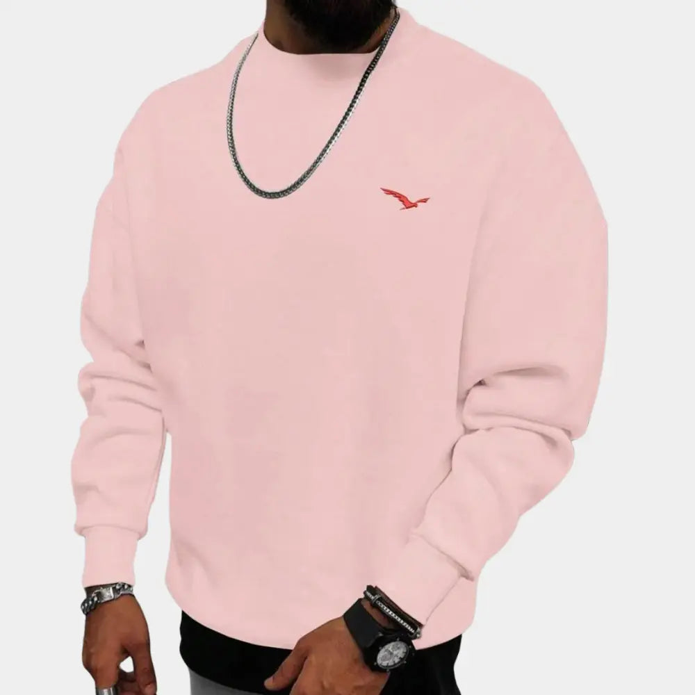 Mann i elegant rosa herre genserskjorte, med tidløs stil som passer til både hverdag og mer formelle anledninger.