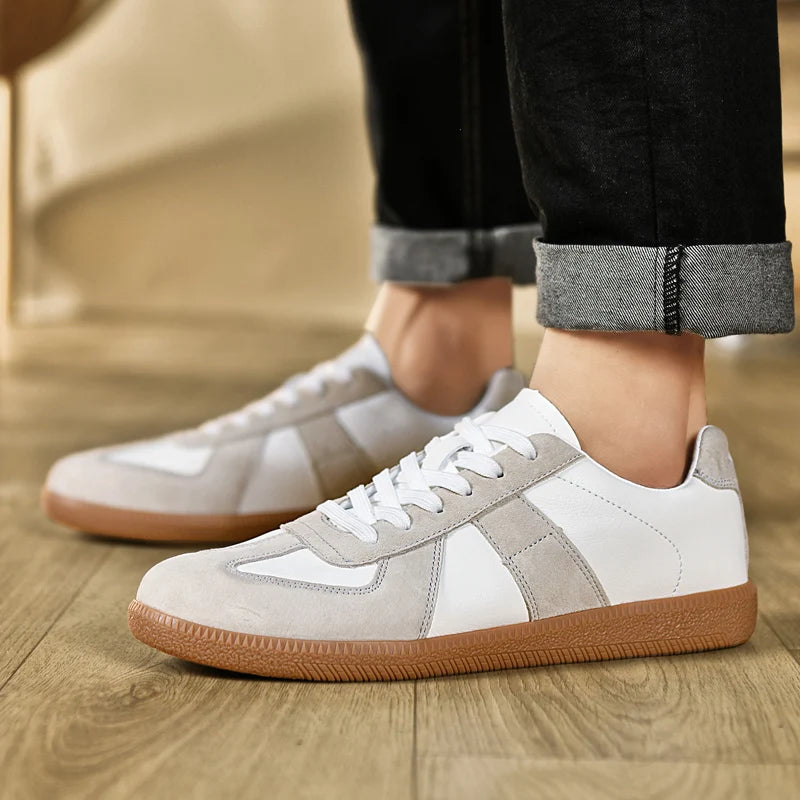 Grønne herresneakers for menn, en sporty og komfortabel fritidssko.