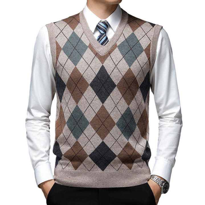 Elegant herresweater med v-hals, ermeløs for lag-på-lag. Perfekt for formell eller casual herremote.