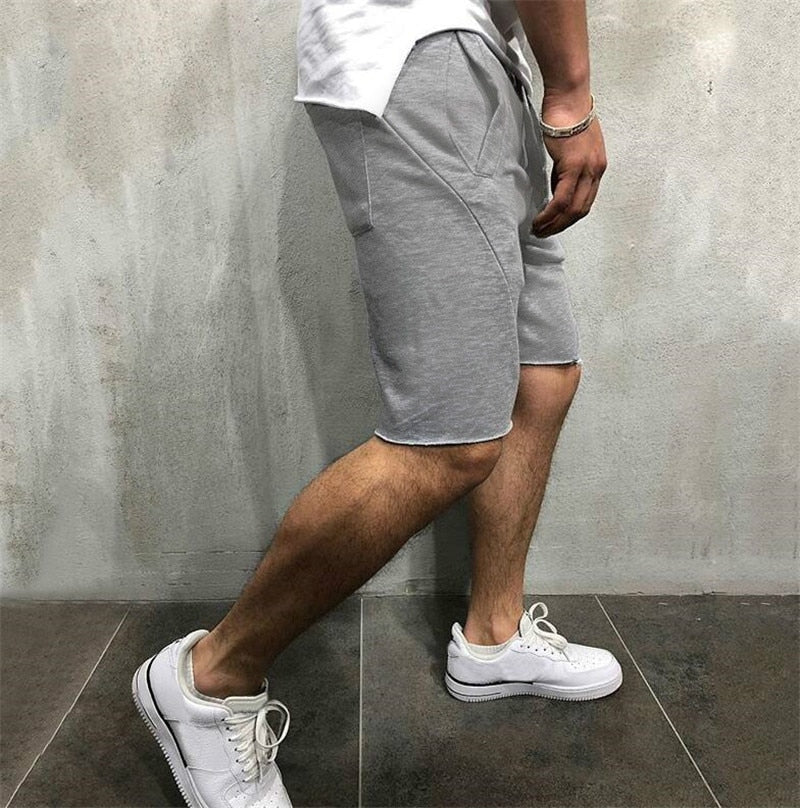 Pustende og komfortable sommer shorts for menn; ideelle for varme dager.
