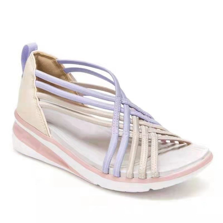Dame sandaler med fokus på komfort og stil. Sporty slip-on fottøy med kilehæl, ideelt for sommer og fritid.