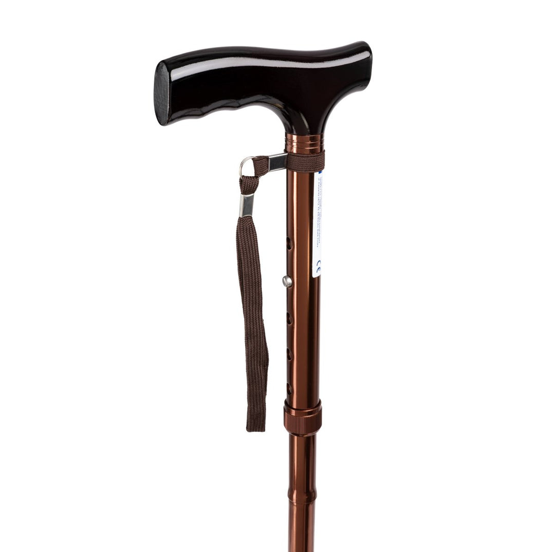 Detalj av justerbar gåstokk i aluminium med ergonomisk håndtak, gir sikkert grep og støtte.
