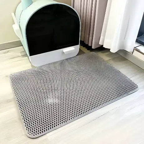 Hygiene: Stor, sklisikker kattesandmatte med poterens som holder gulvet og hjemmet rent.