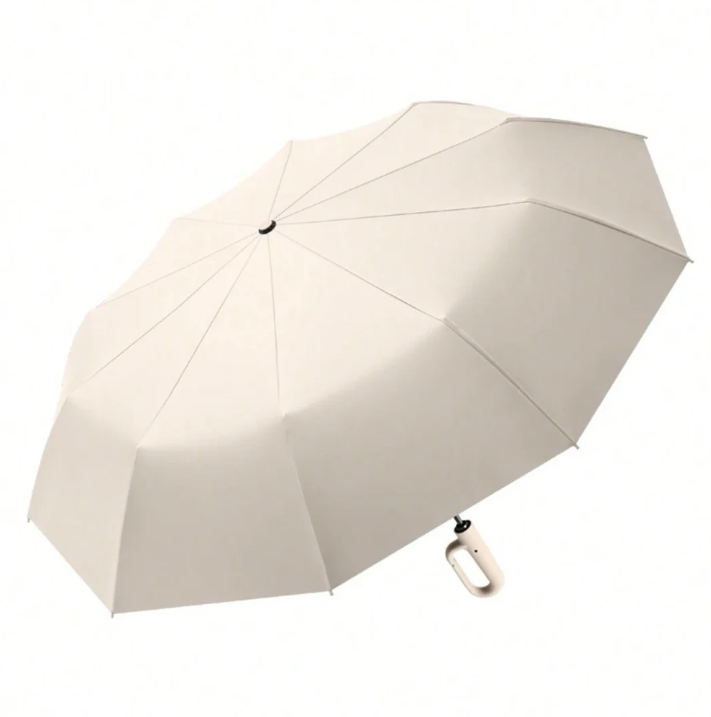 Slitesterk duk på reflekterende stormparaply, beskytter effektivt mot regn og vind.
