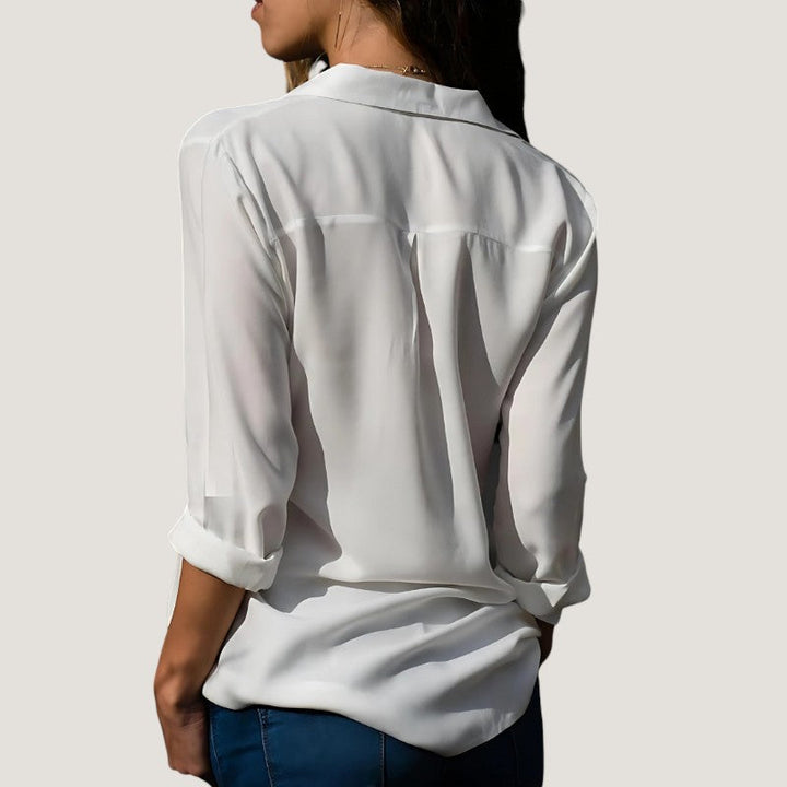 Tidløs elegant damebluse, perfekt for kontor og fritid. Komfortabel og feminin vårbluse.