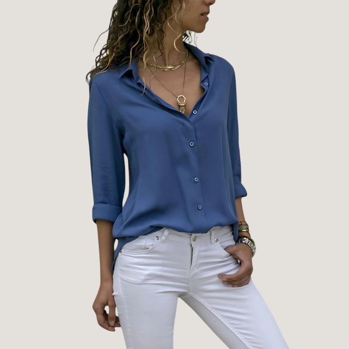 Feminin damebluse med elegant design, allsidig for våren og sommeren. Komfortabel for hverdag.