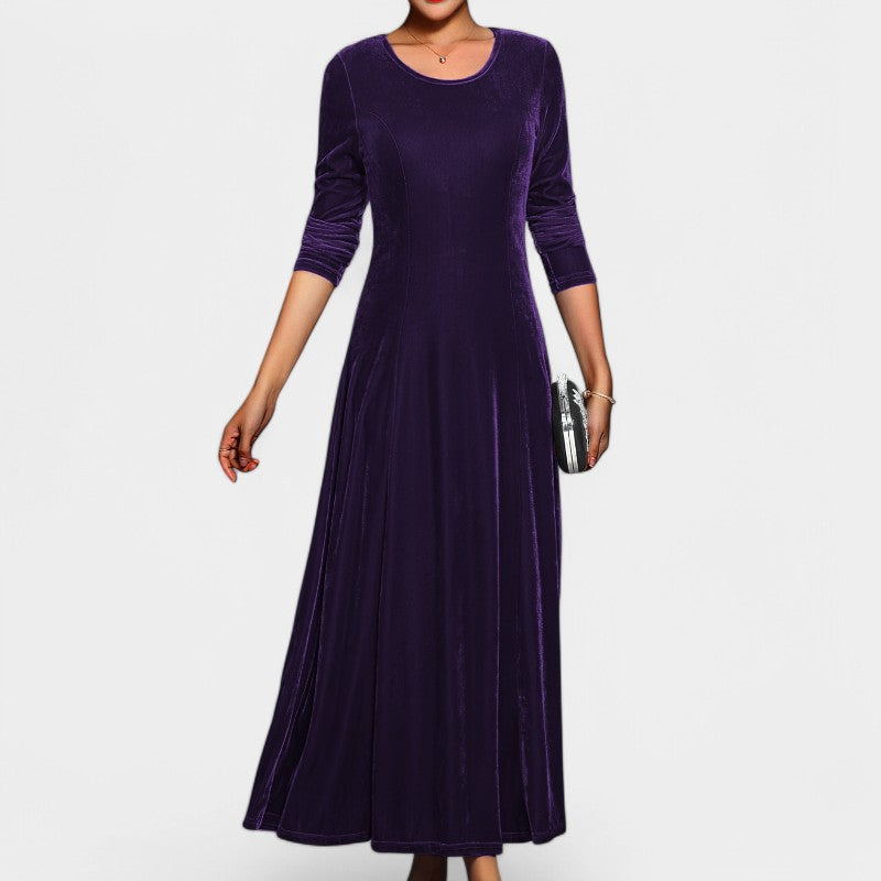 Tidløs A-linje midikjole for kvinner, med lange ermer. Passer som festkjole eller elegant hverdagskjole.