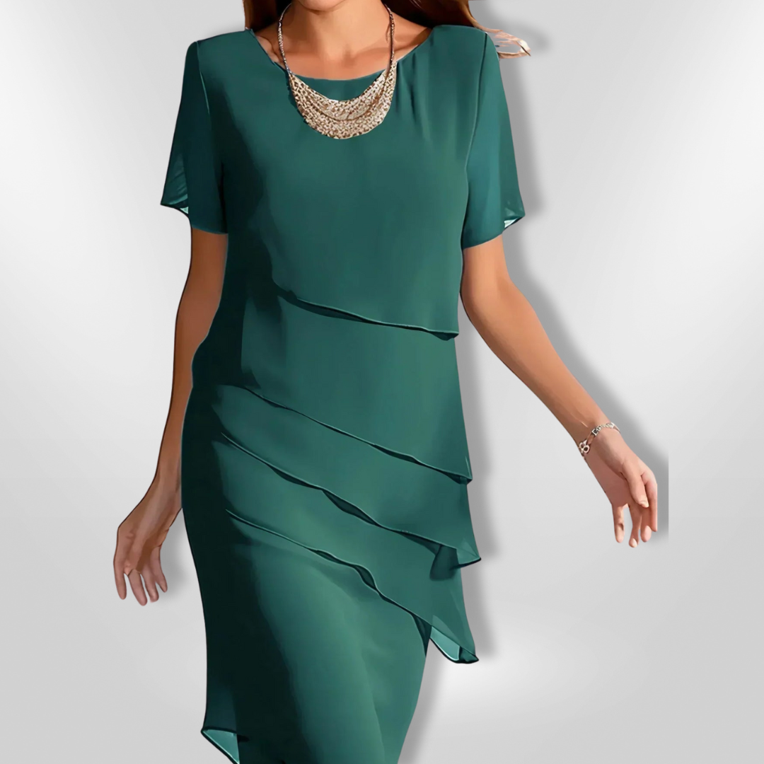 Lett og elegant kvinners chiffonkjole. Flott selskapskjole for fest, bryllup og formelle anledninger.
